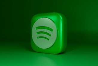 a green square shaped object with a green background
