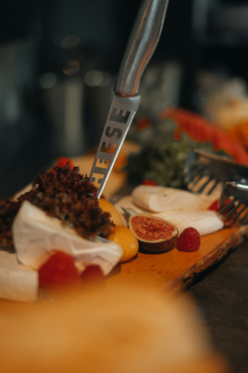 a close up of a cutting board with fruit on it