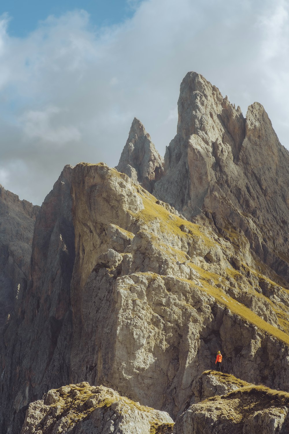 a person standing on top of a rocky mountain