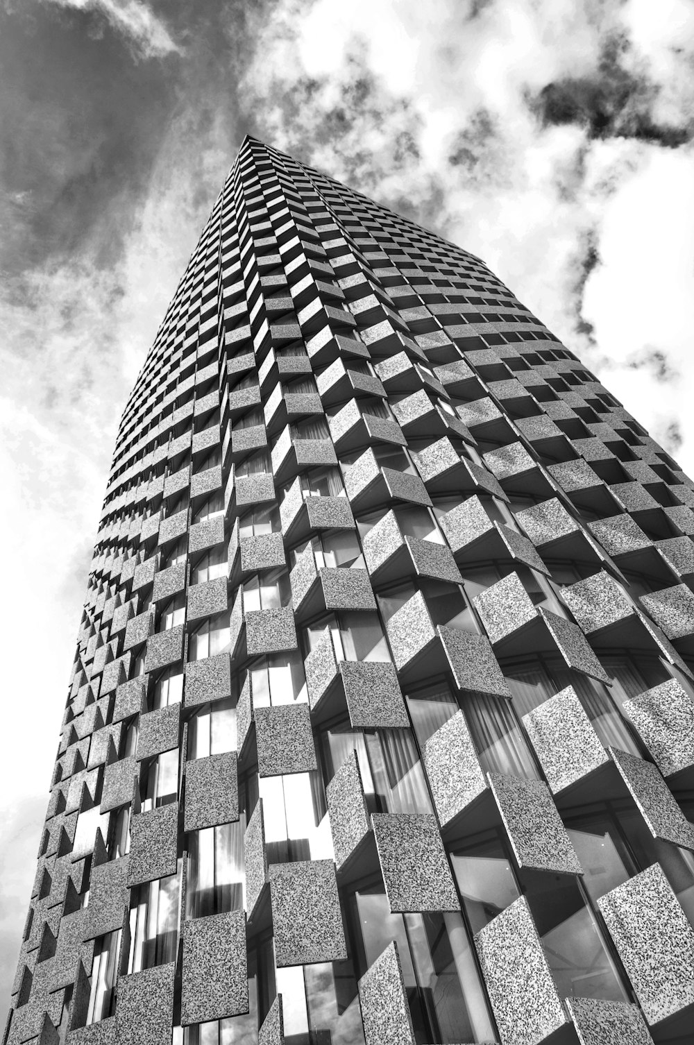 a black and white photo of a tall building