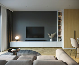 a living room with a couch and a television