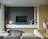 A modern living room featuring smart home devices and a cozy atmosphere.