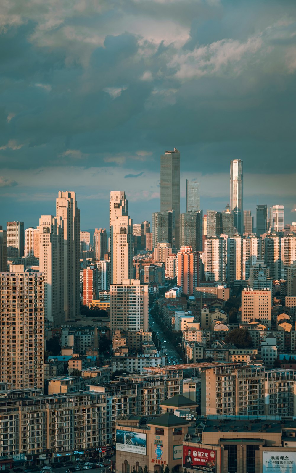 a view of a city with tall buildings