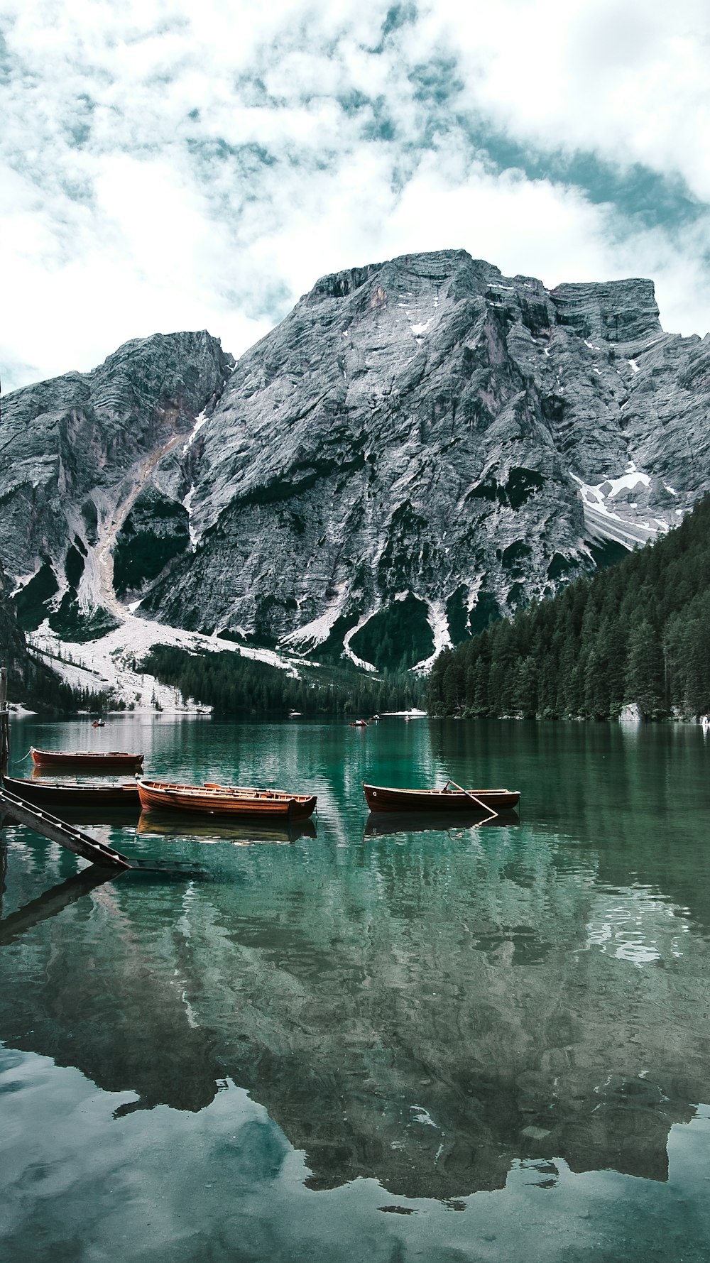 a couple of boats that are sitting in the water