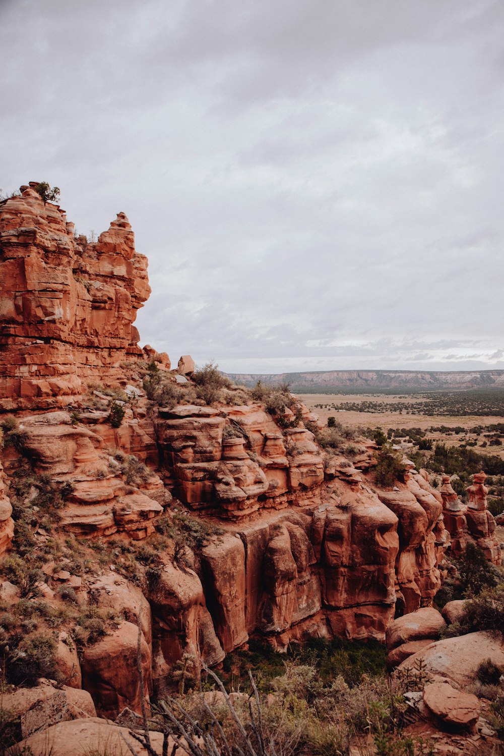 a rocky outcropping in the middle of a desert