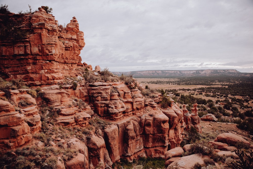 a rocky outcropping in the middle of a desert