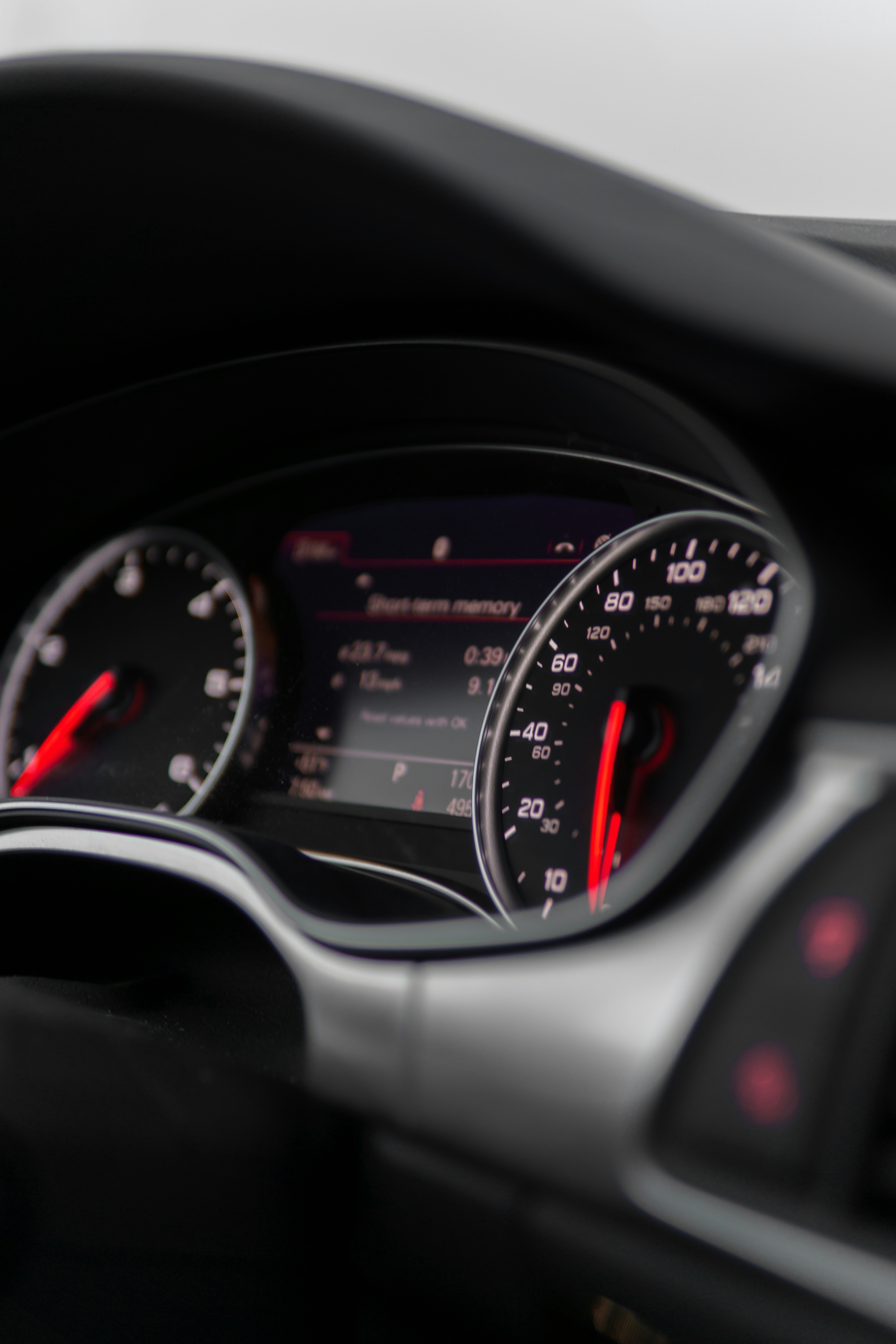 The dashboard of a car with speedometers and gauges photo Free Audi