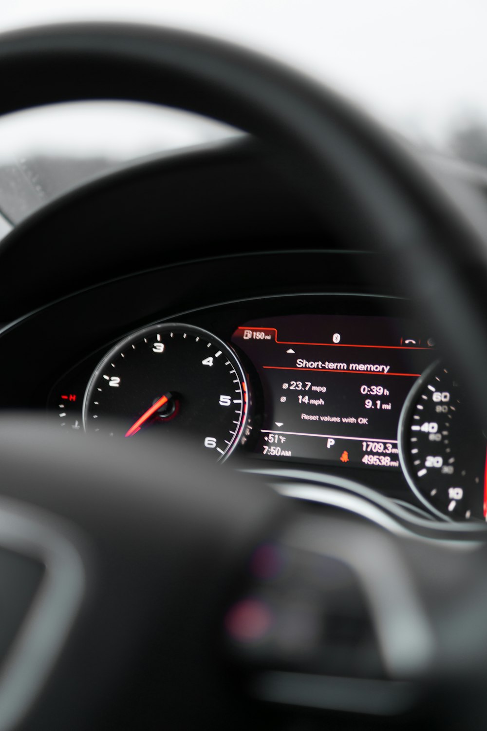 the dashboard of a car with a speedometer