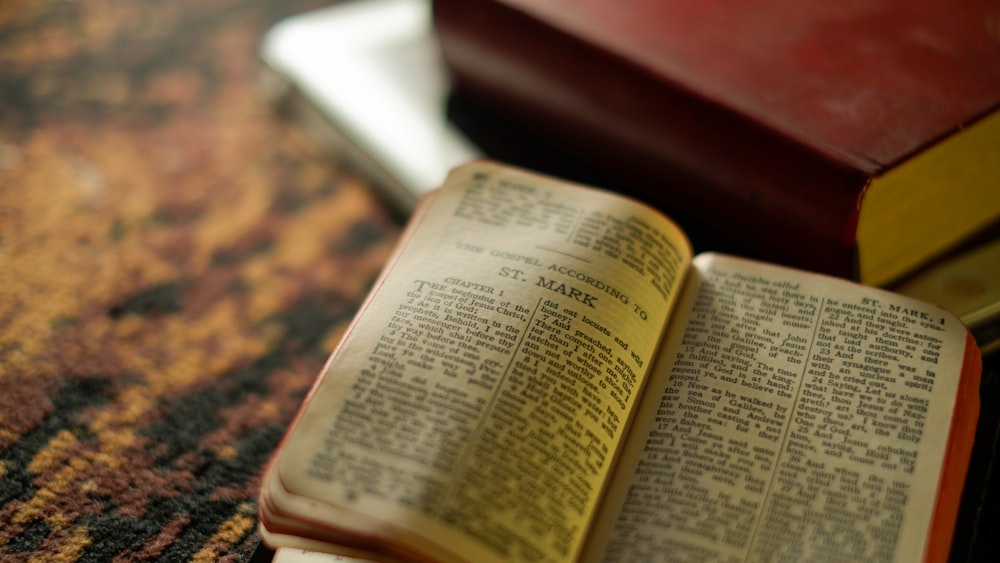 an open book sitting on top of a table