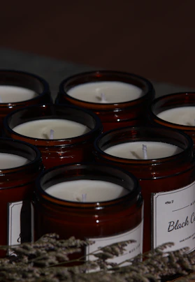 a close up of a bunch of candles on a table
