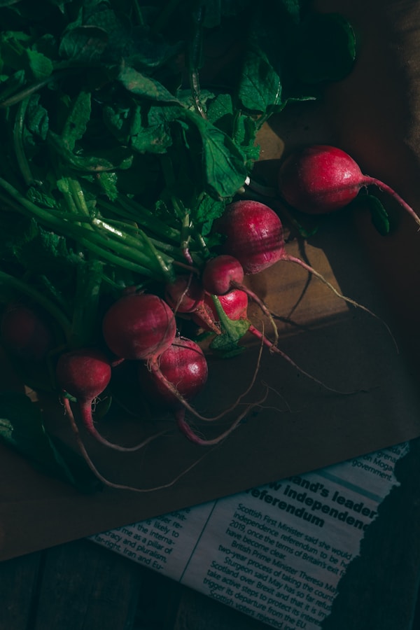 A bunch of radishes sitting on top of a cutting board