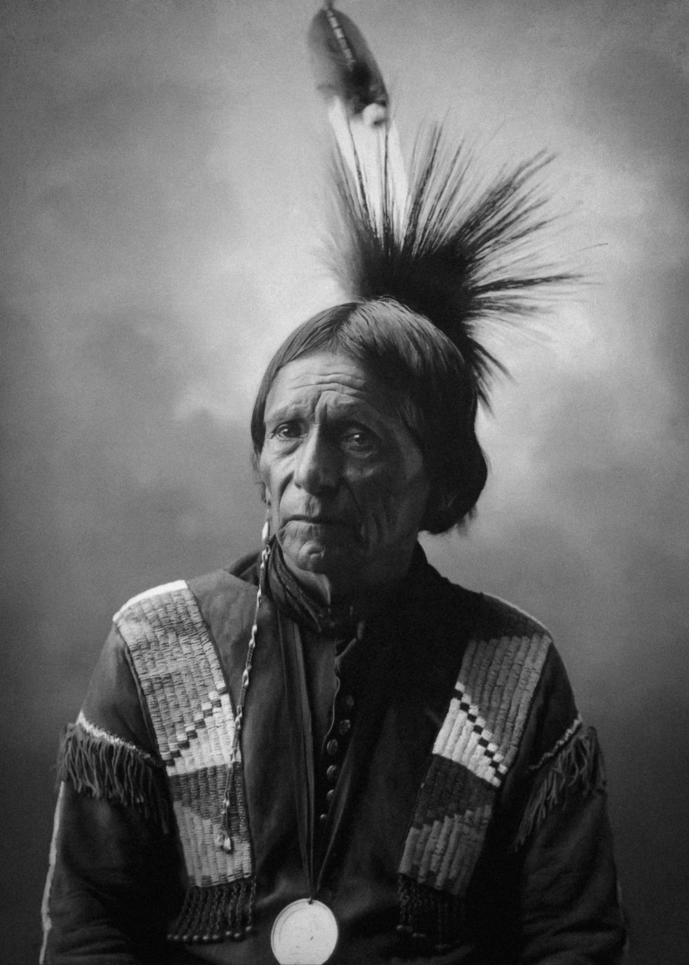 an old photo of a native american man