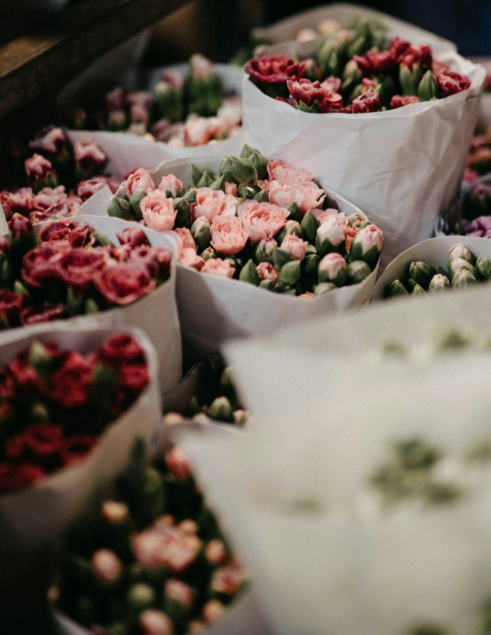 a bunch of flowers that are sitting on a table