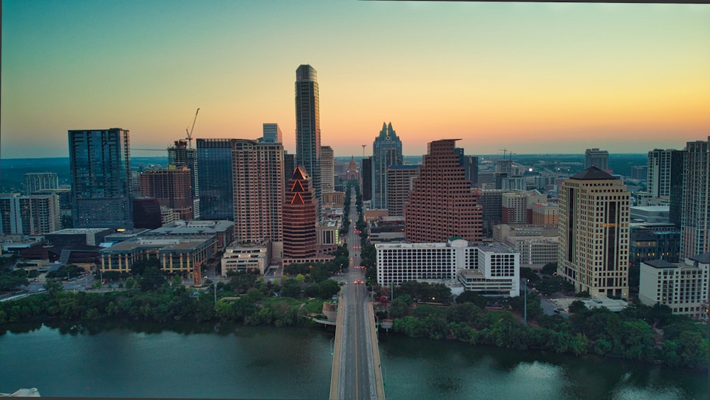 an aerial view of a city with a river running through it