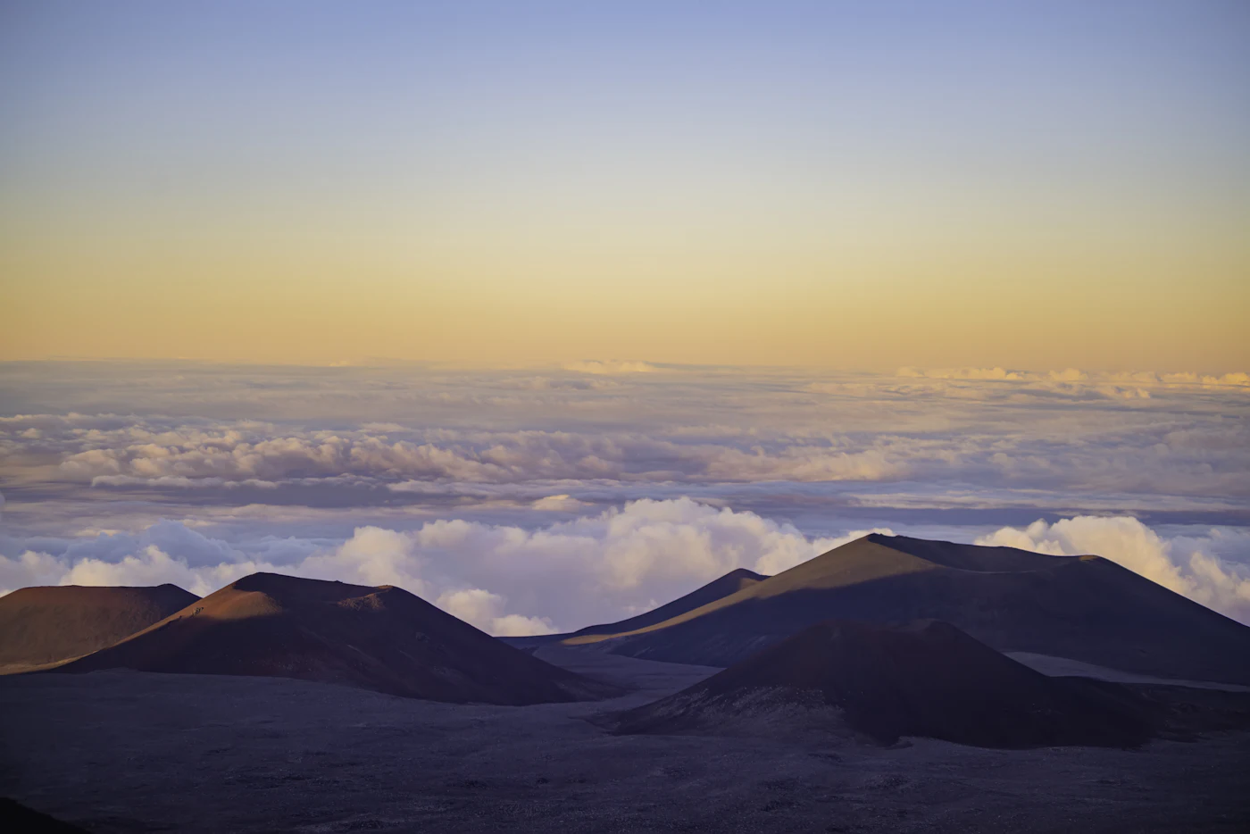 The summit of Mauna Kea above a sea of clouds on Hawaii's Big Island