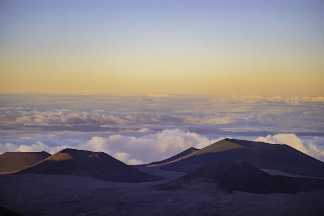 The summit of Mauna Kea above a sea of clouds on Hawaii's Big Island