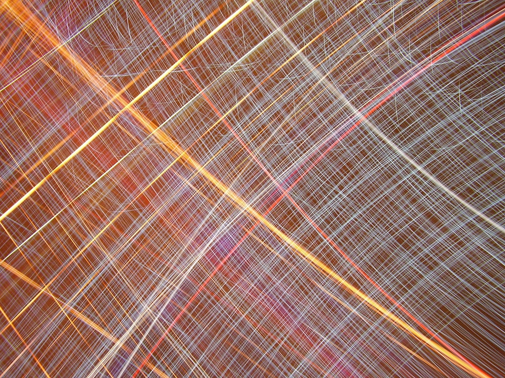 an abstract image of lines in orange and red