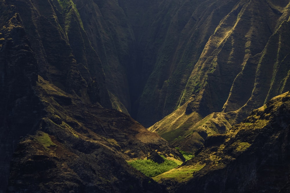 a view of a valley with a mountain in the background