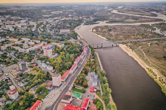 an aerial view of a city and a river