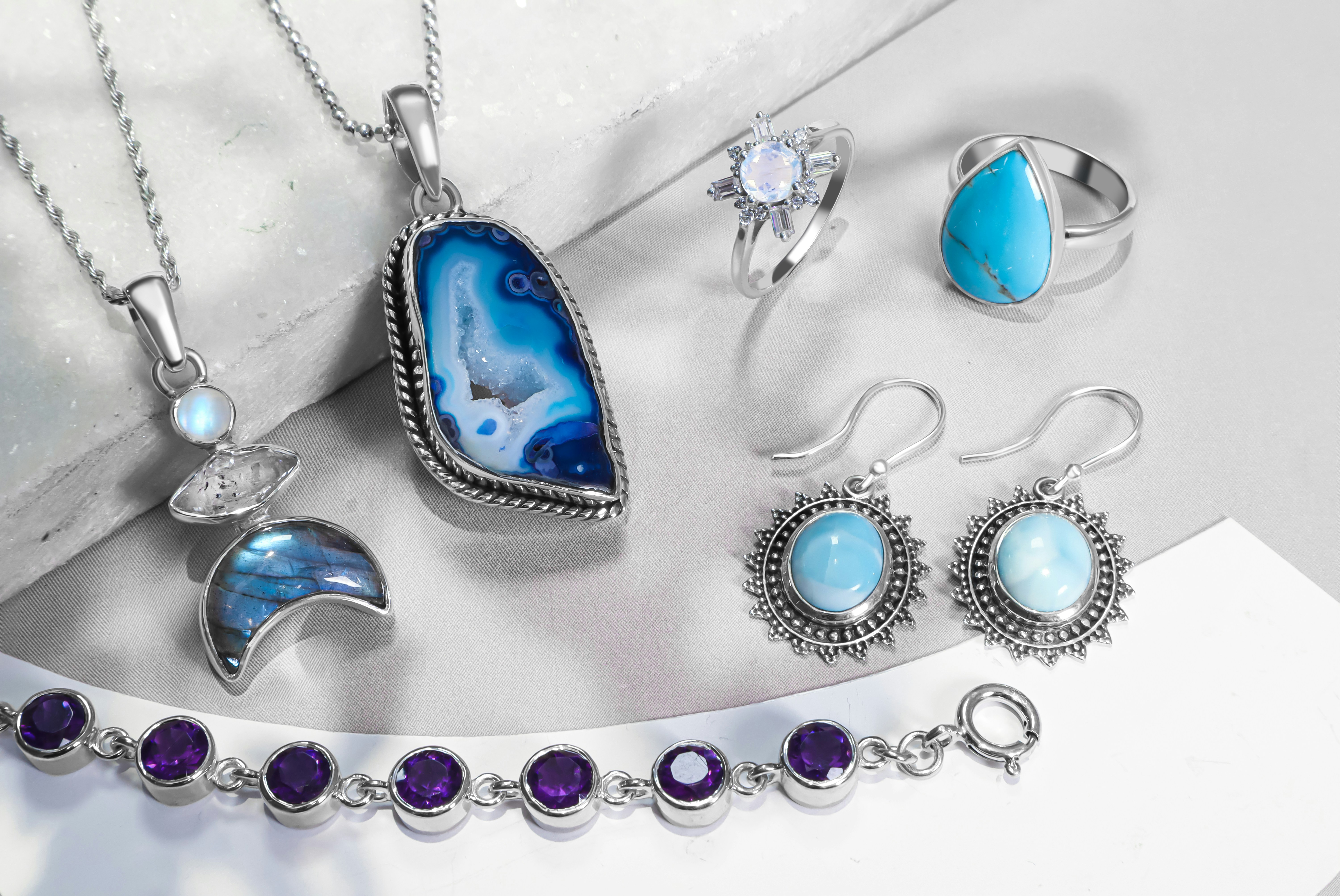Crystal jewelry, protective amulets, and sacred symbol accessories