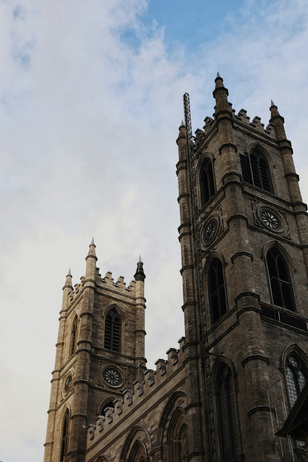 a very tall building with a clock on it's side