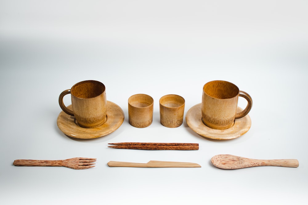 a group of wooden utensils sitting on top of a table