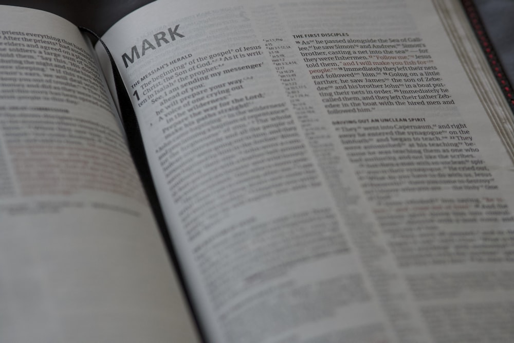 a close up of an open book with words on it