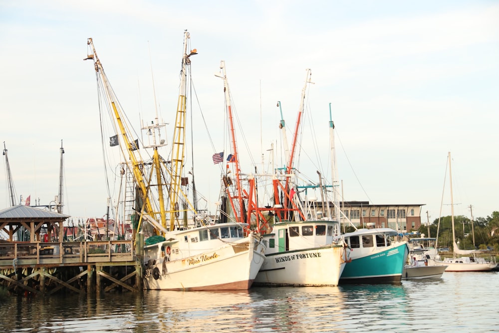 a group of boats that are sitting in the water