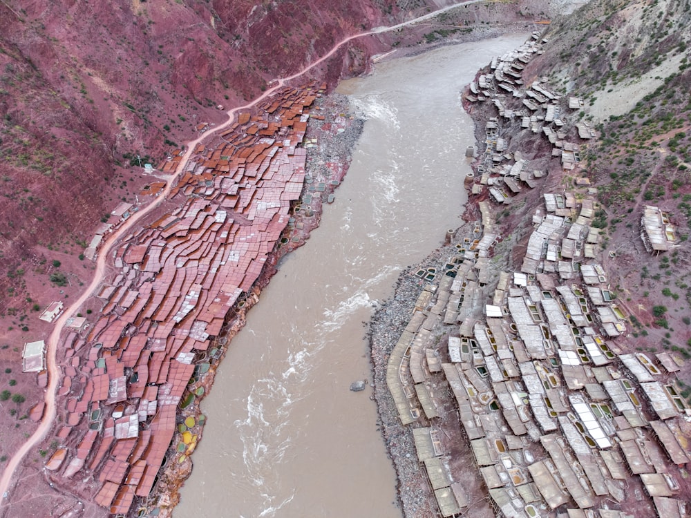 an aerial view of a river running through a canyon