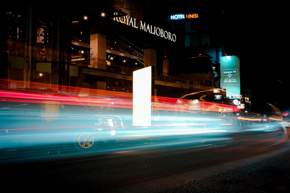 a blurry photo of a city street at night