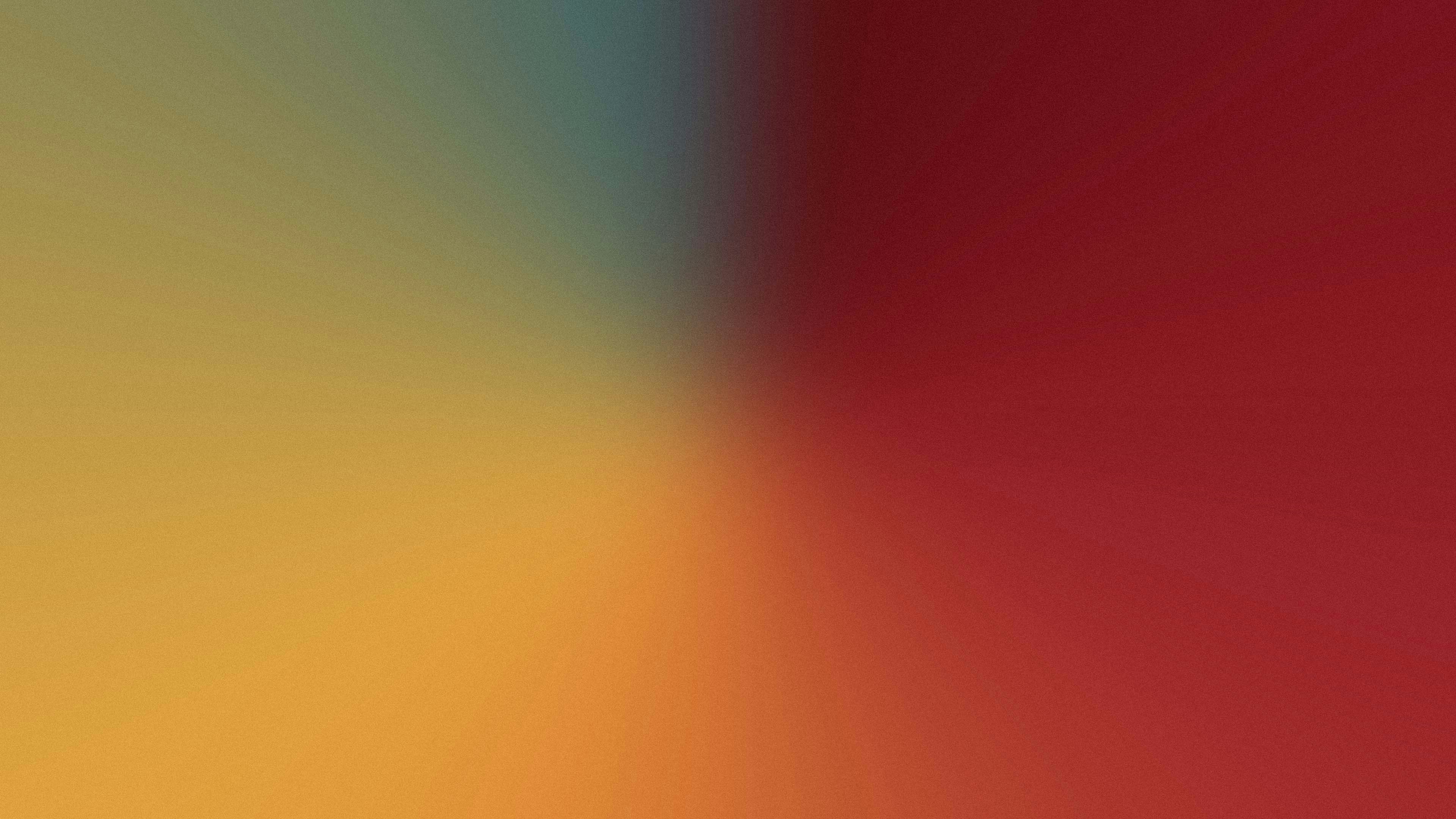 a close up of a red and yellow background