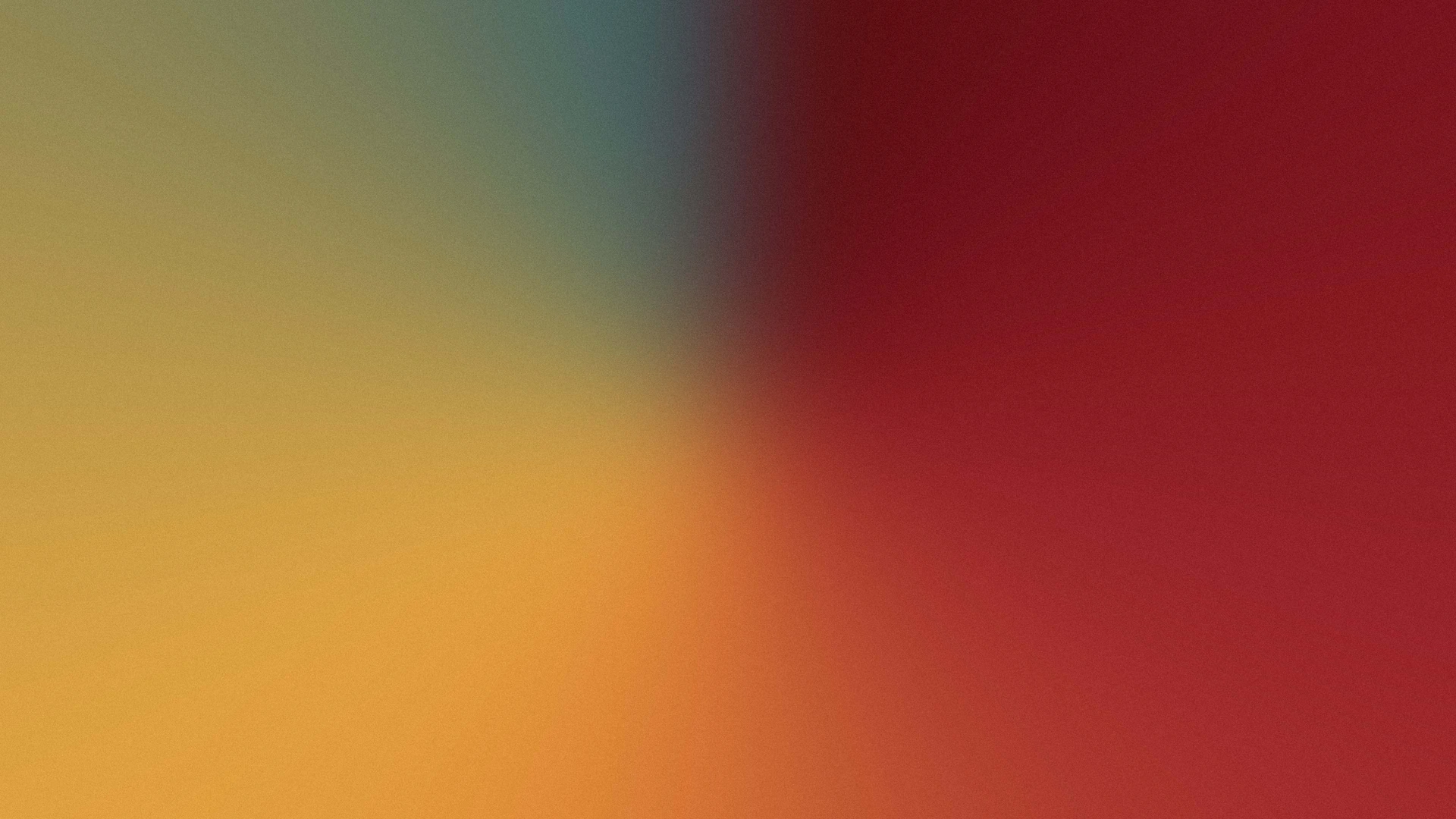 a close up of a red and yellow background