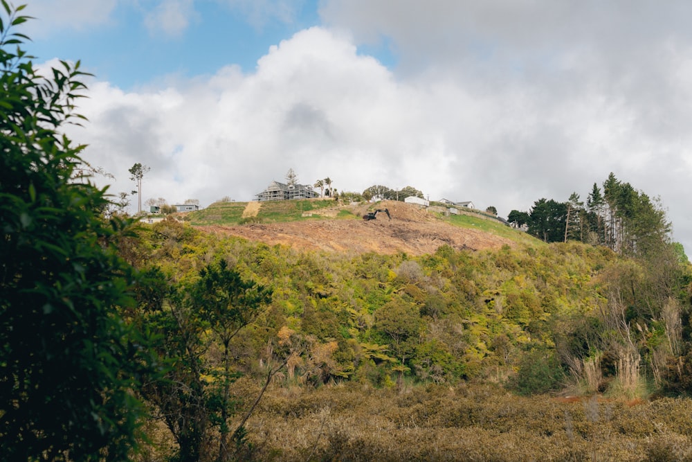 a hill with a house on top of it