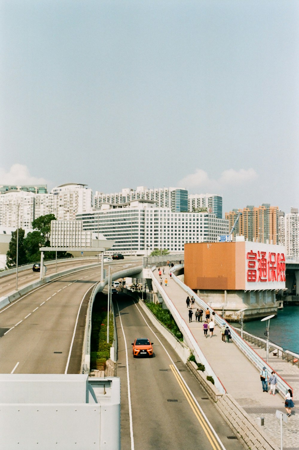 a view of a city with a bridge over a river