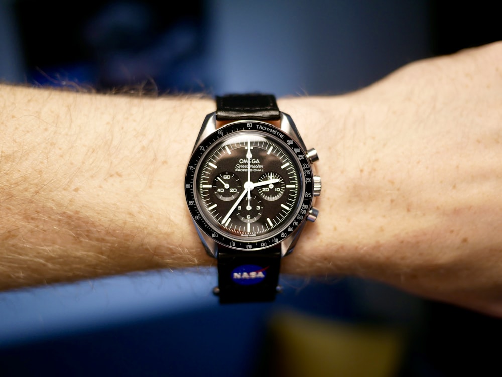 a close up of a person's wrist with a watch on it