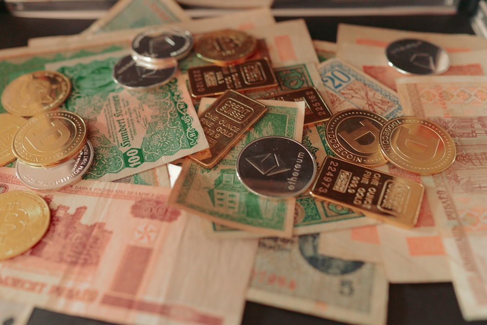 a pile of foreign currency sitting on top of a table