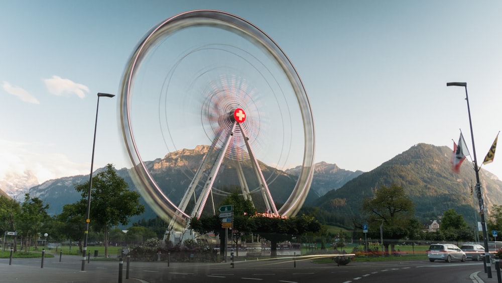 a large ferris wheel on a city street