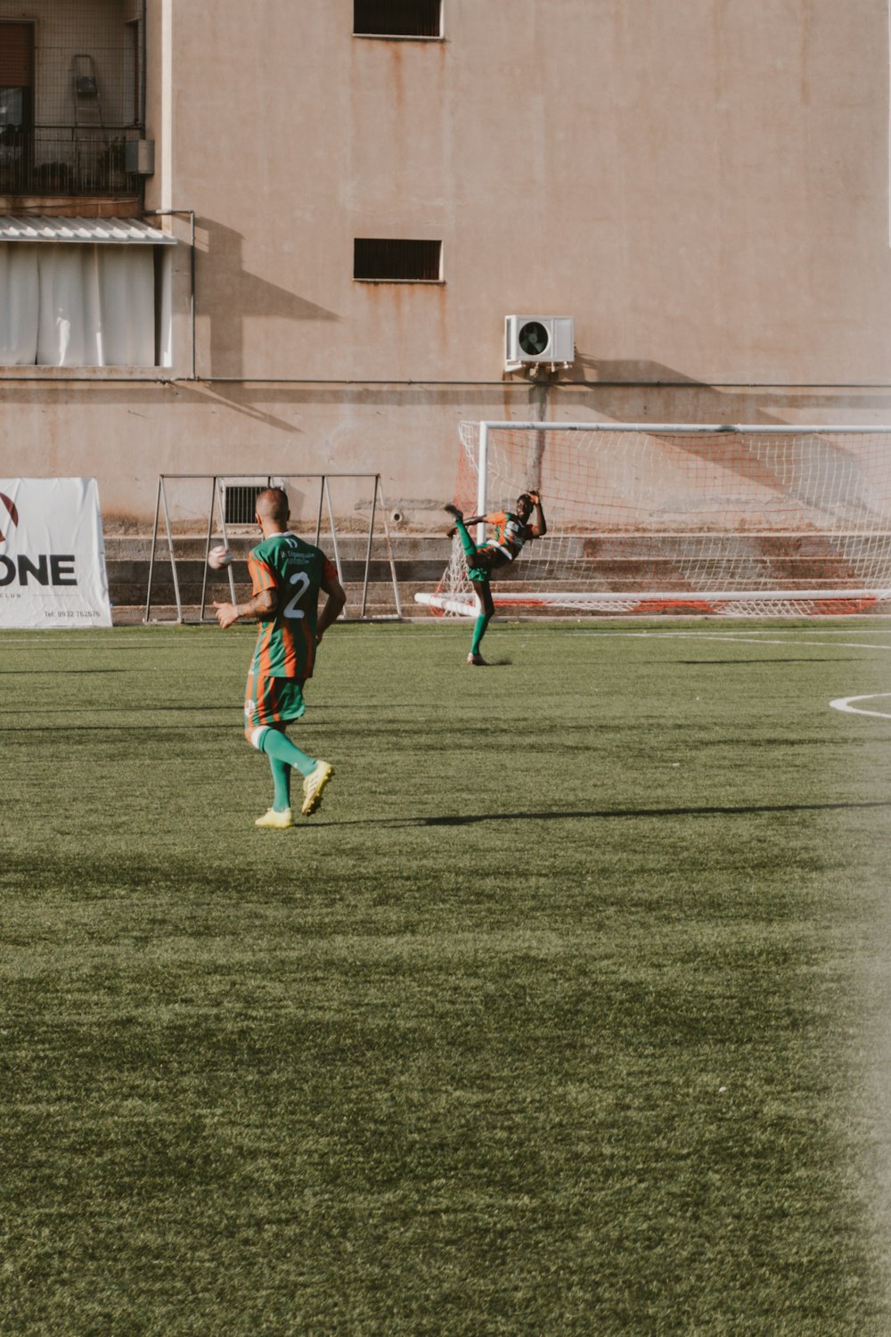 a group of young men playing a game of soccer