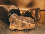 a couple of rocks sitting on top of a table