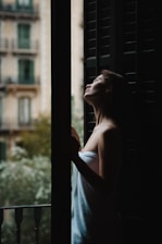 A peaceful scene of a person using recovery tools after a workout, bathed in natural light.