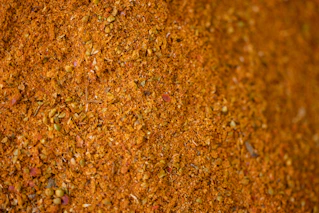 a pile of ground spices on top of a table