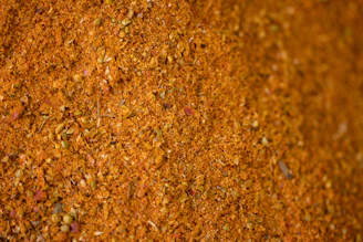 a pile of ground spices on top of a table