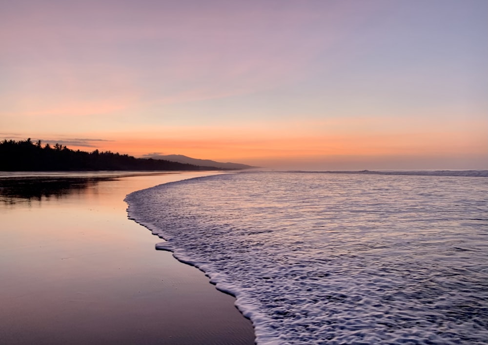 a beach that has some water in it