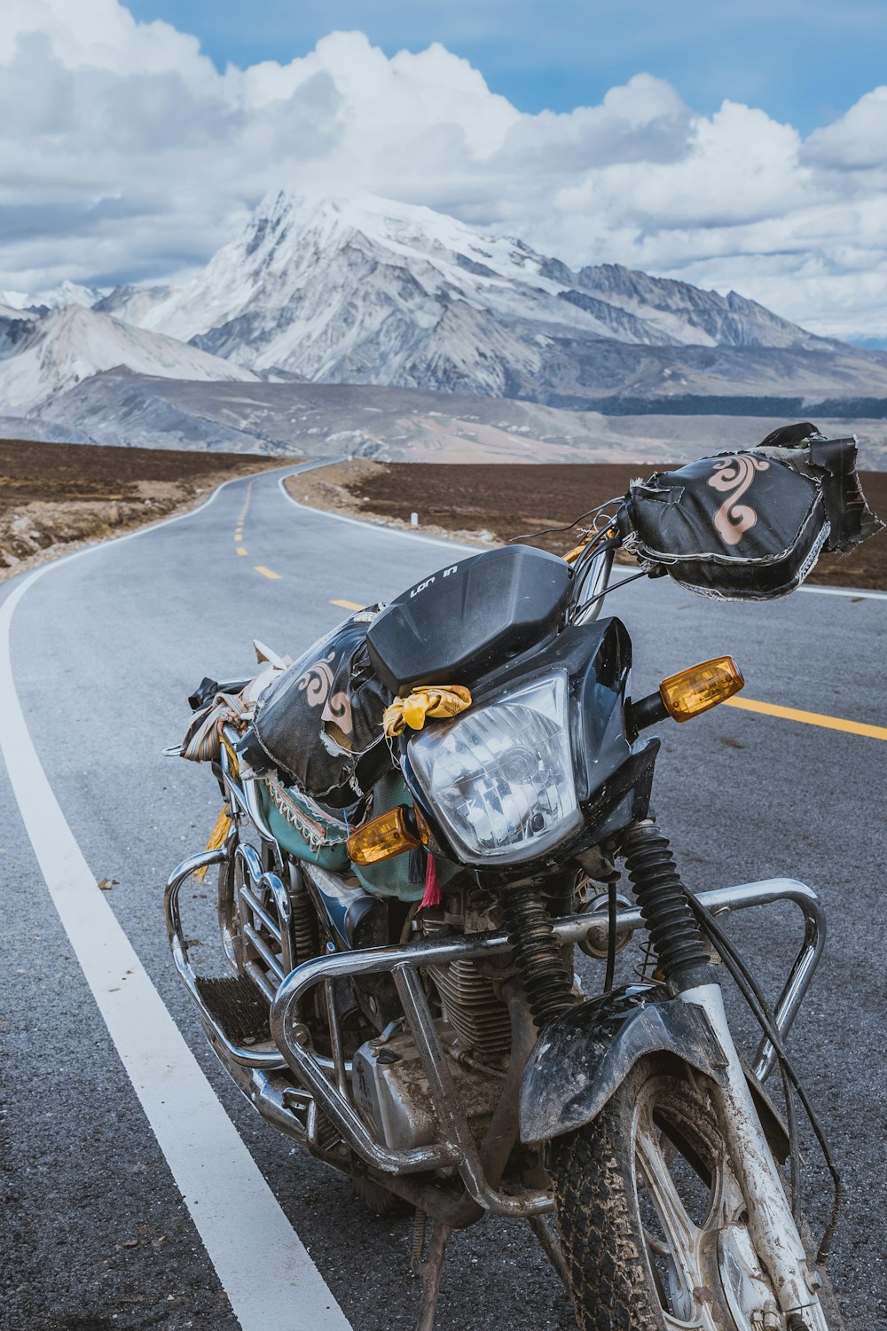 a motorcycle parked on the side of the road