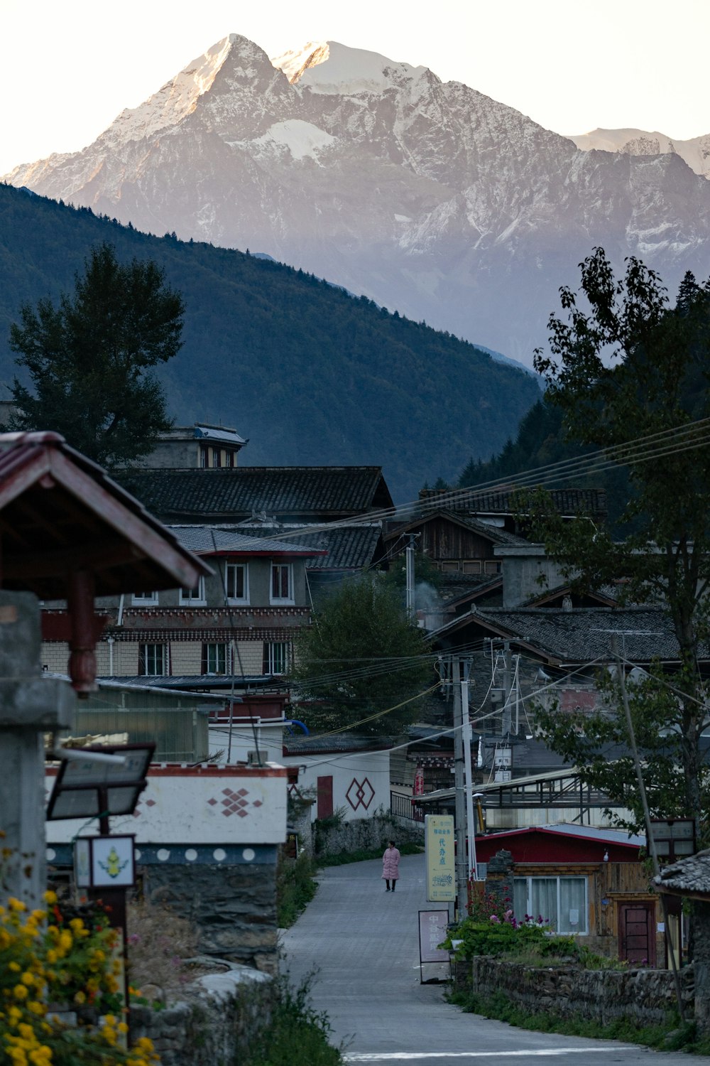 a house with a mountain in the background