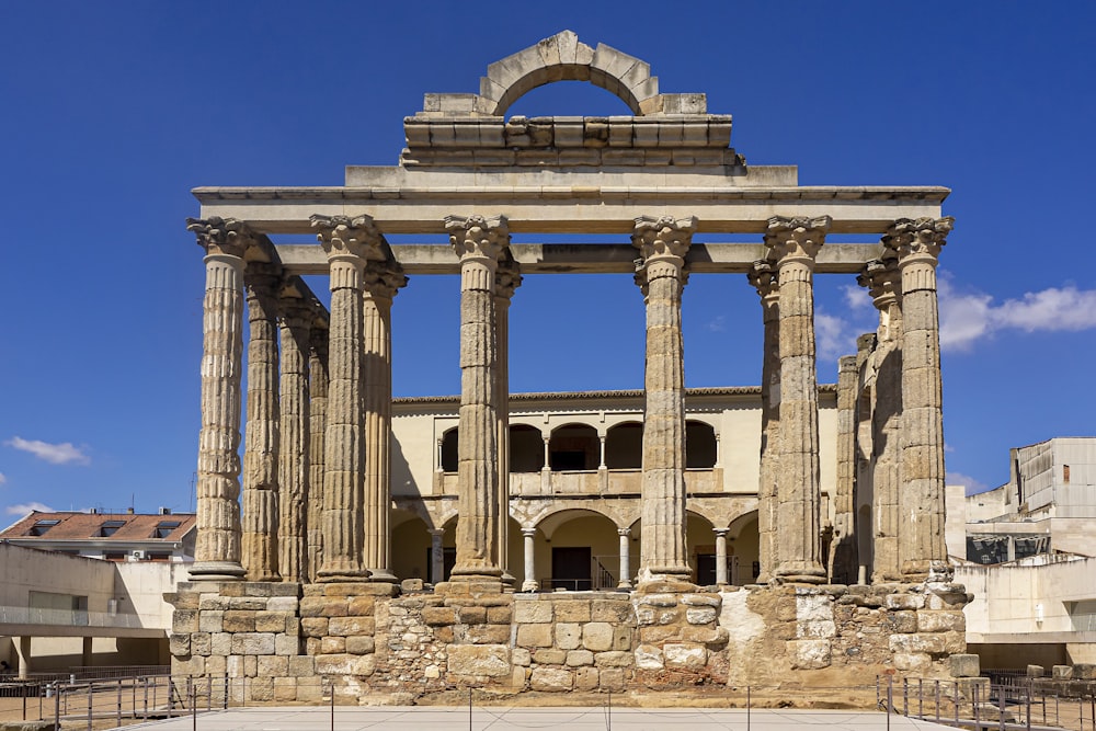 a large stone building with columns and arches