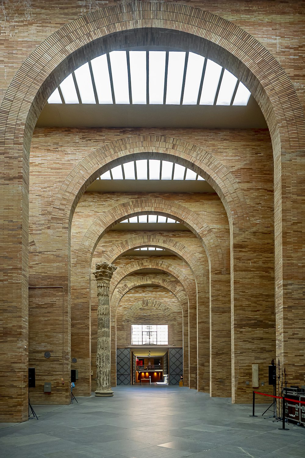 a large brick building with a large arched doorway