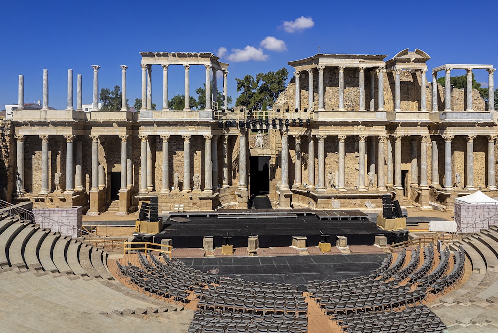 a large building with a lot of seats in front of it