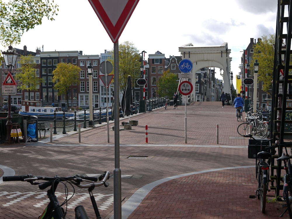 a bicycle parked on the side of a road