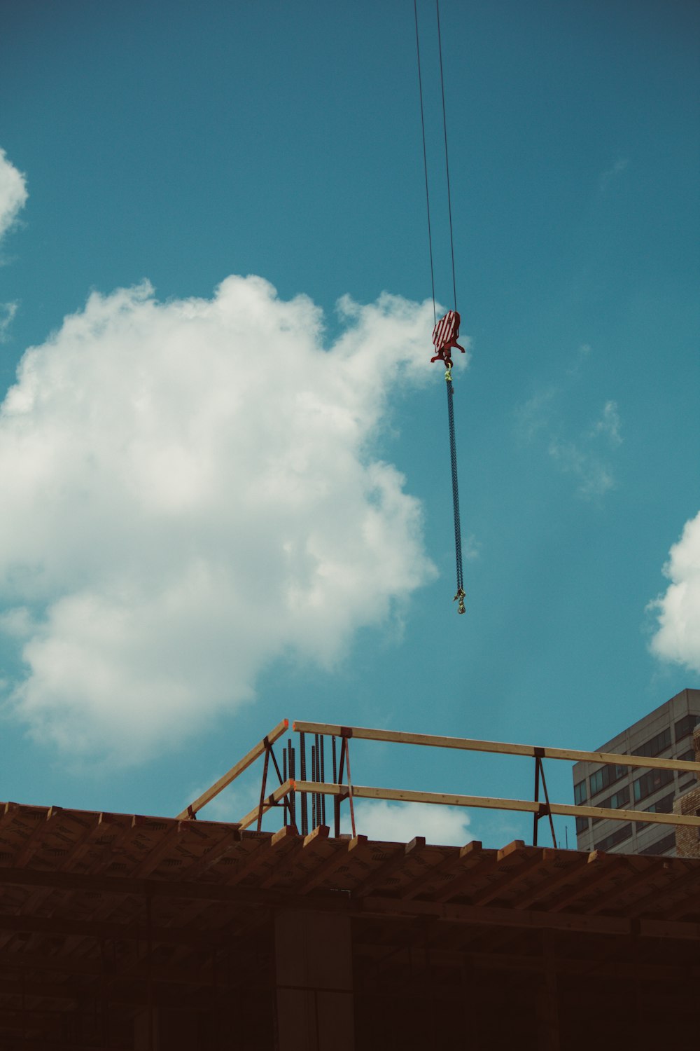 a crane that is on top of a building